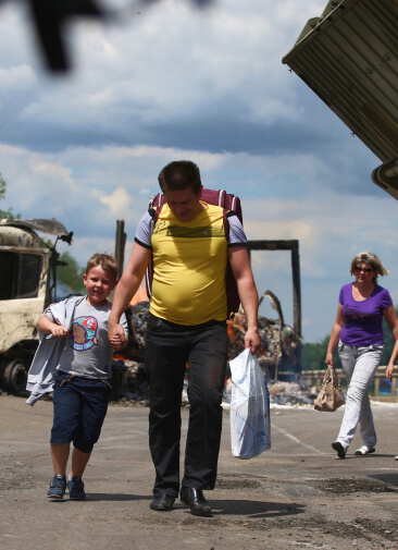 «Мы сбежали из ада». Как украинские переселенцы обустраиваются в России и Европе
